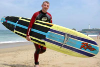 Plumby with his longboard