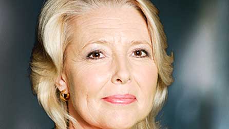 Nia Caron oedd gwraig y gweinidog yn y gyfres deledu Porc Peis Bach