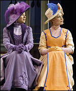 Women sitting beside one another