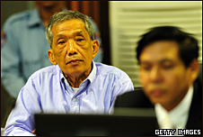 Kaing Guek Eav, also known as "Duch" sits in the courtroom