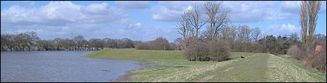 The river Ouse slowly fills Rawcliffe Meadow
