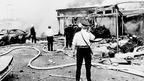 Emergency service workers at the scene of an explosion in Oxford Street bus station in the heart of Belfast during 'Bloody Friday', 21 July 1972 (Press Association)