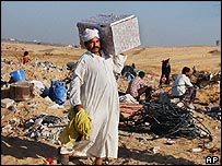 Cena de devastação em Mughraq