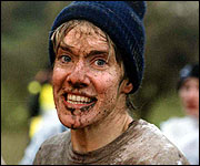 Woman wth muddy face.