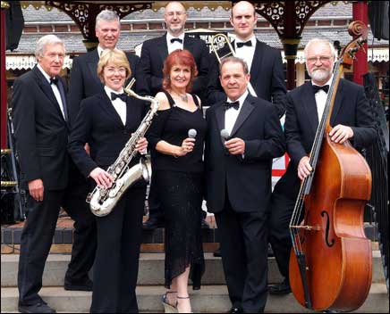 Members of a band holding their instruments 470