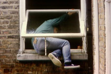 Somebody climbing through a window