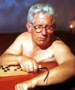 Adam Hart-Davis using a strigil