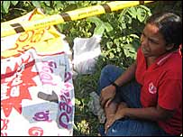 Sivaram's daughter in front of his body