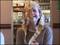 Boy with pants on his head