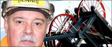 Dennis Fisher in front of Caphouse Colliery pitwheel