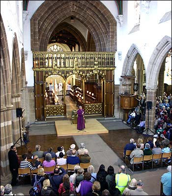 Bishop Tim Stephens welcomes a huge crowd to Leice