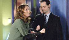 A woman being arrested by the police