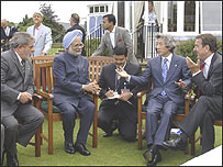 मनमोहन सिंह विश्व जी-4 के नेताओं के साथ