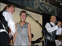 Robbie on stage at the wedding with Sally Goodwin and James Hazell