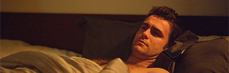 A man sleeping on a couch