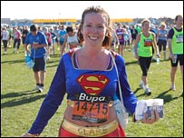 Woman in Supergirl costume at the end of Great North Run 2008