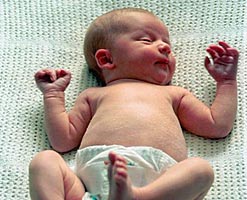 A baby placed on its back