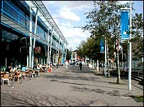 Brayford Pool front with water  clock on the right and information board on the left.