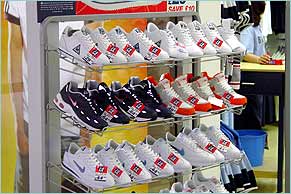 Pairs of trainers in a sports shop