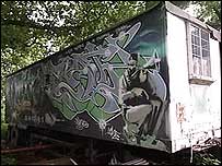 The van with Banksy grafitti.