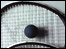 Squash racket and ball.