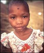 Red People series - girl with artificial flower 
