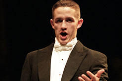 An opera singer in full song