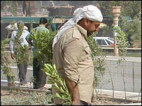 Trabalhadores na Praça Firdus