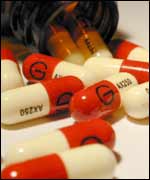 Tablets pouring from a bottle