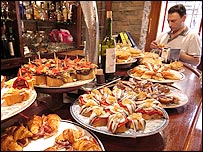 Eating tapas at a bar in San Sebastian