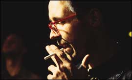 Steve Coogan smoking a cigarette 