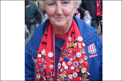 Stoke City fans with badges