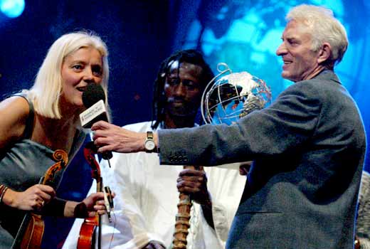 Ellika and Solo receive their awards from Charlie Gillett