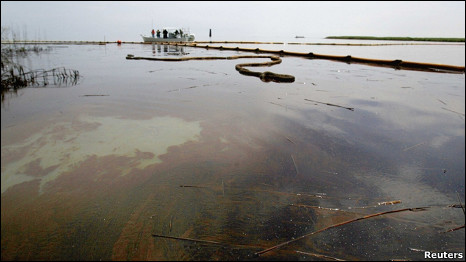 Oil floats on the surface in Pass A Loutre near Venice, Louisiana May 26, 2010