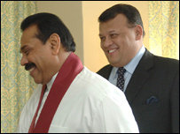 Minister Samarasinghe (R) with President Rajapaksa