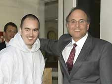 TJ (Thaddeus Jimenez) and lawyer Steven Drizin.  Loren Santow/AFP/Getty Images