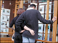 Buyers look in Estate Agents Window