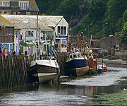 When the tide at Looe harbour goes out, it can only accommodate smaller boats