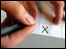 Voter marking cross