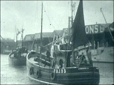 Fishing ship leaving Gt Yarmouth by Norman Bassett