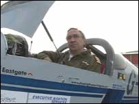 Manuel Queiroz in his plane