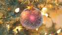 A bauble on a Christmas tree