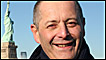 Nick Baker with the Statue of Liberty in the background, New York