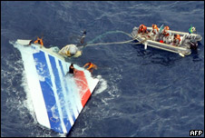Brazilian Navy divers recovering part of the tail section from the Air France aircraft that crashed over the Atlantic ocean in 2009