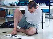 Peter Longstaff paints another piece of work