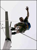 Man in Bosun's chair aloft