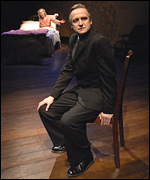 A man turning away from his wife