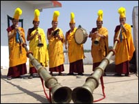 Tibetan monks in traditional dress.