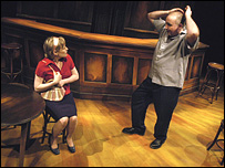 Man and woman in a pretend bar