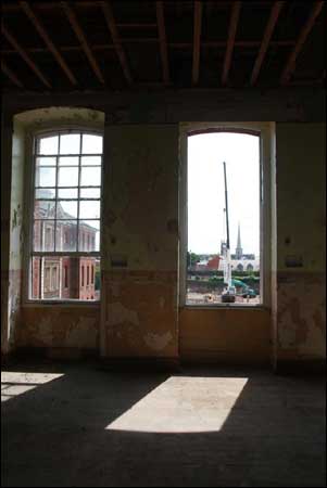 Crane seen through a window